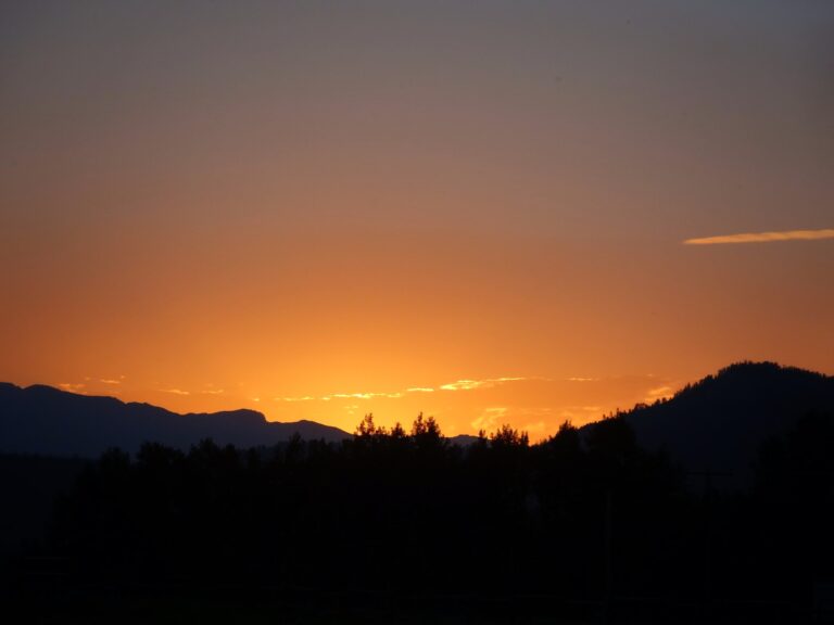 The sun sets over Yosemite